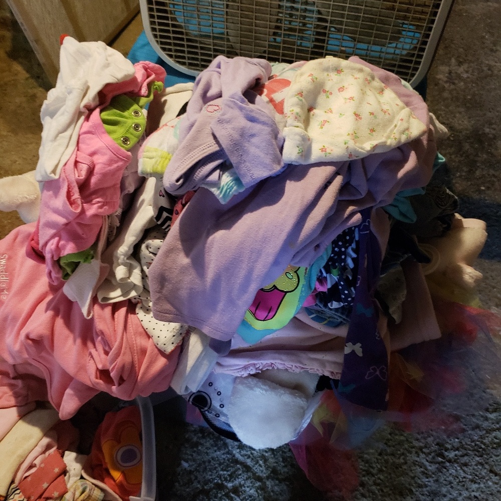 Whole bunch of baby clothes